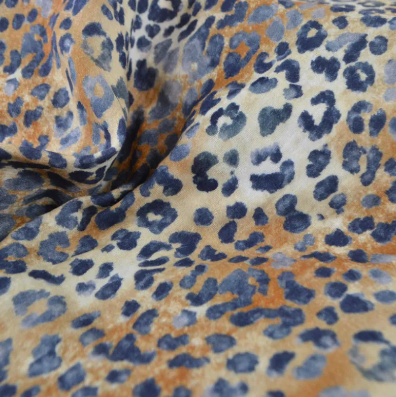 Tissu double gaze motif léopard Sable et bleu marine