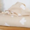 Tissu double gaze motif oiseaux blancs fond beige - OEKO TEX