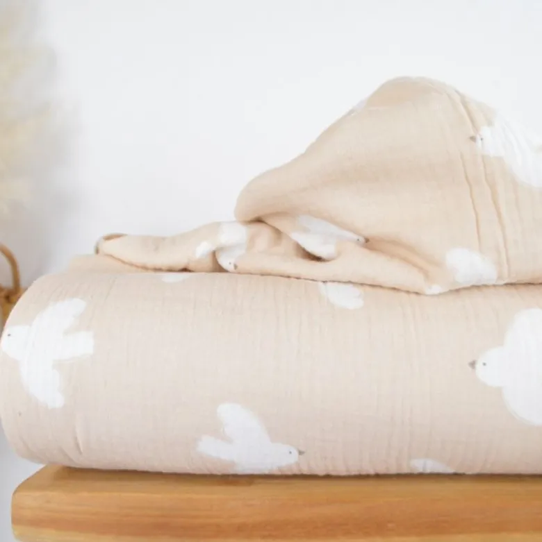 Tissu double gaze motif oiseaux blancs fond beige - OEKO TEX