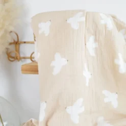 Tissu double gaze motif oiseaux blancs fond beige - OEKO TEX