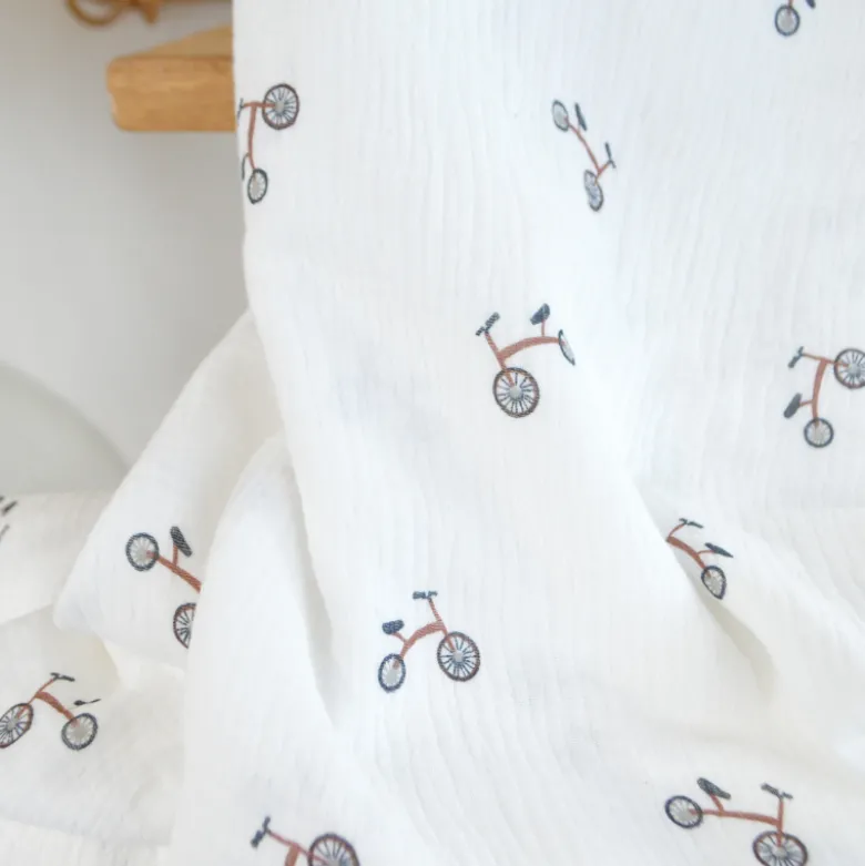 Tissu double gaze motif vélos fond blanc cassé - OEKO TEX