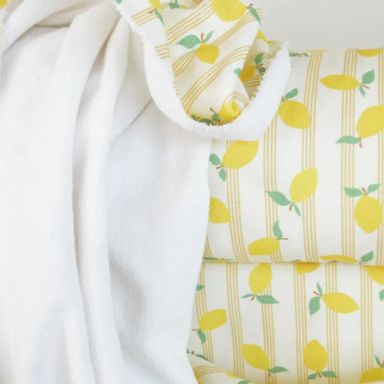 Tissu Eponge de coton monoface Lime motif citrons fond écru