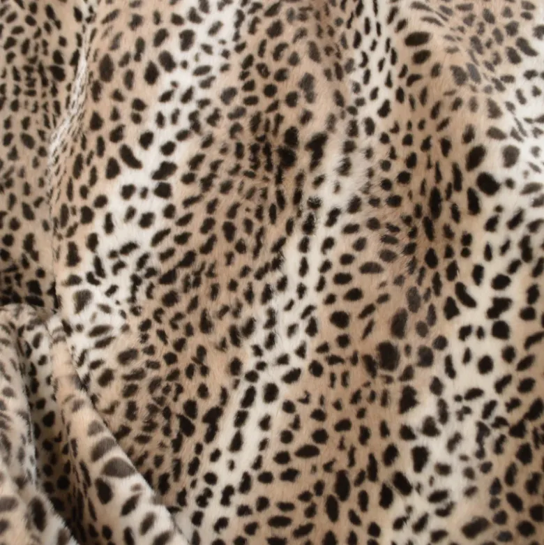Tissu fausse fourrure rabbit Guepard noir fond Galet