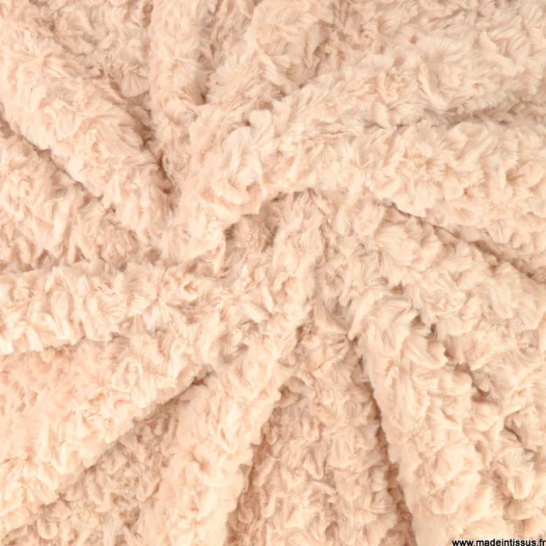 Tissu fausse fourrure rose poudré