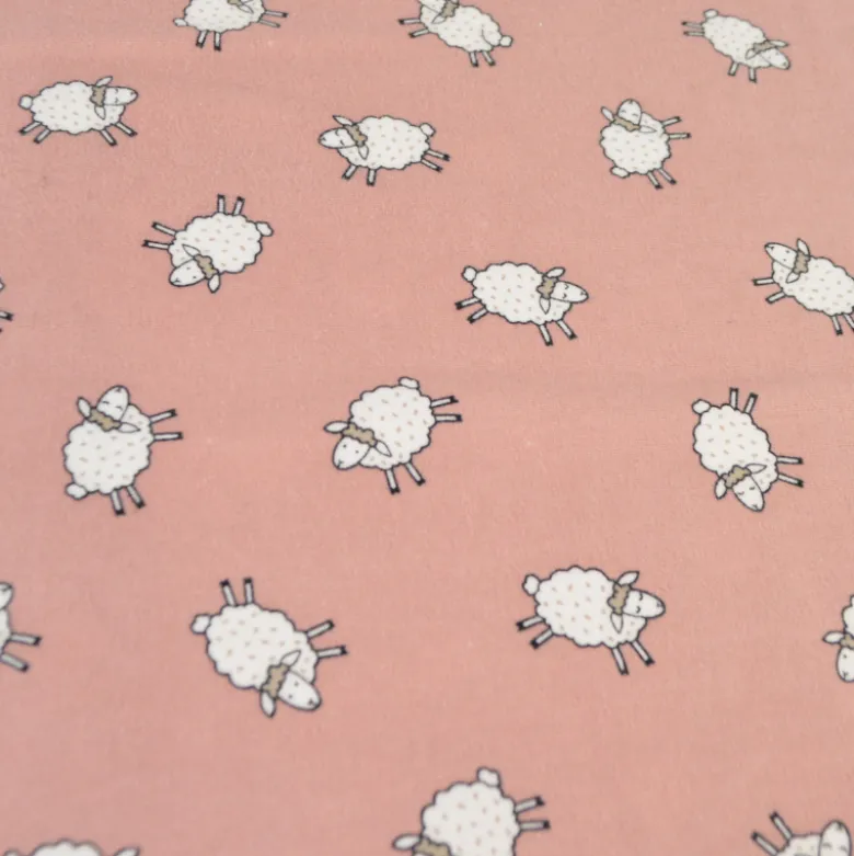 Tissu flanelle de coton Poppy motif moutons fond vieux rose