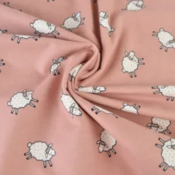 Tissu flanelle de coton Poppy motif moutons fond vieux rose