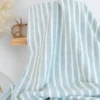 Tissu fluide polyester aspect Lin à rayures vert olive et blanc