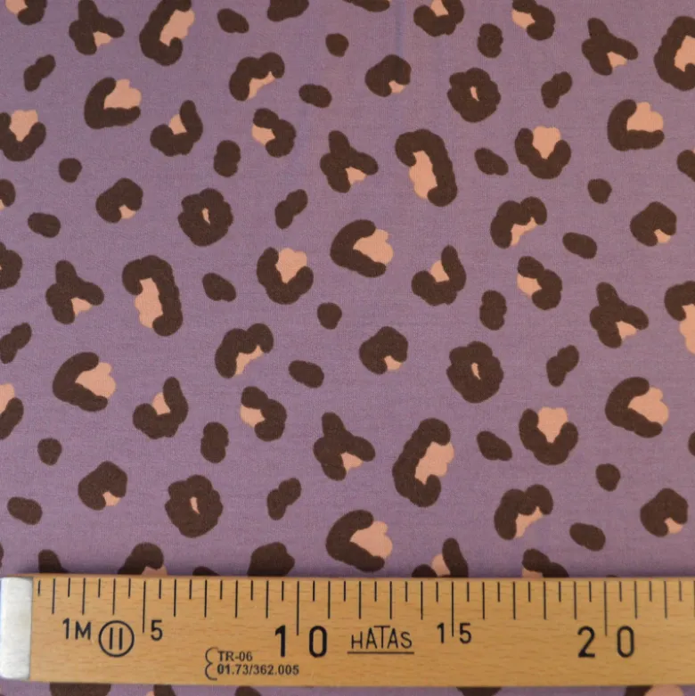 Tissu French Terry coton – Motif léopard fond parme - OEKO TEX