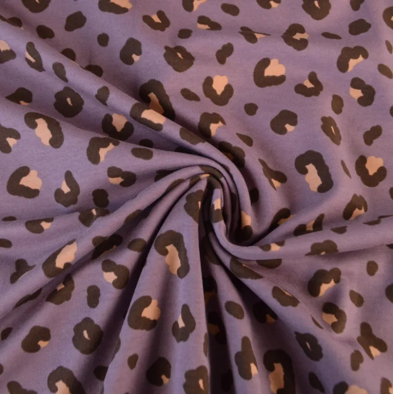 Tissu French Terry coton – Motif léopard fond parme - OEKO TEX