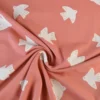 Tissu French Terry coton – Motif oiseaux fond rose corail - OEKO TEX