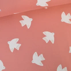 Tissu French Terry coton – Motif oiseaux fond rose corail - OEKO TEX