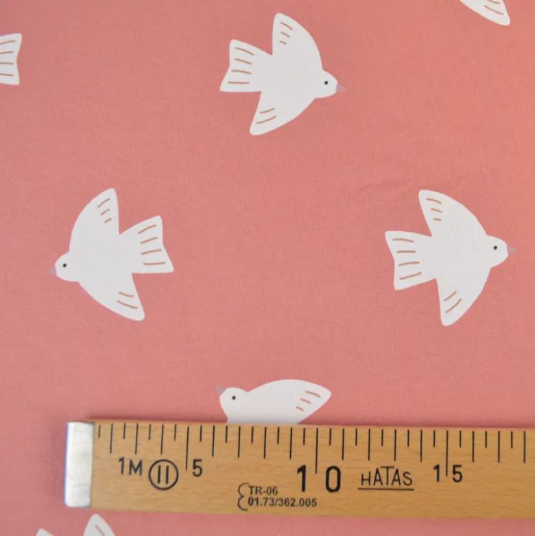 Tissu French Terry coton – Motif oiseaux fond rose corail - OEKO TEX