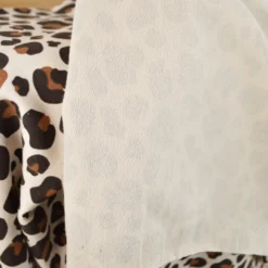 Tissu French Terry coton – Motif léopard caramel fond écru