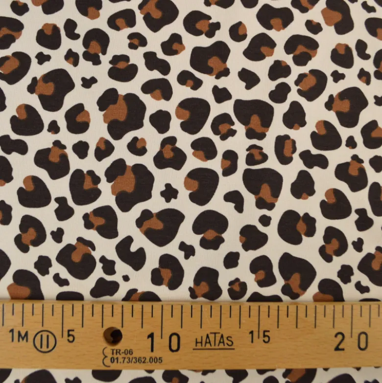Tissu French Terry coton – Motif léopard caramel fond écru