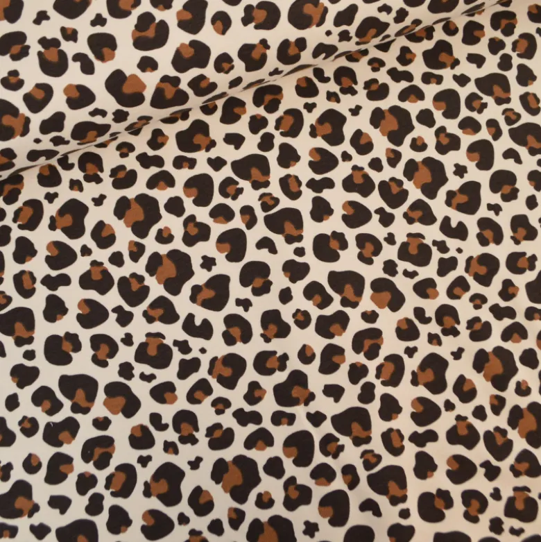 Tissu French Terry coton – Motif léopard caramel fond écru