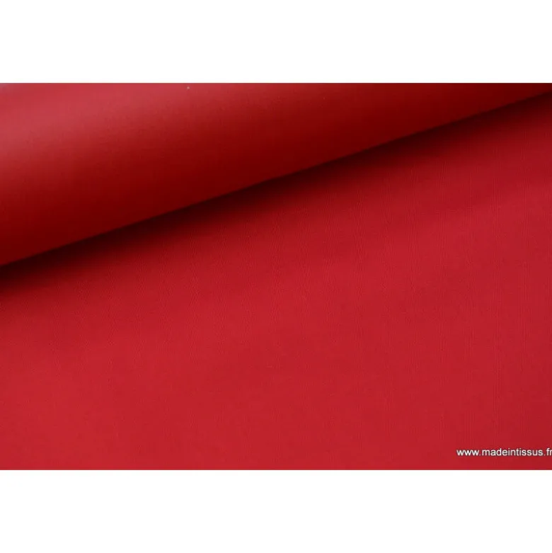 Tissu Gabardine enduite étanche rouge.