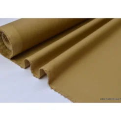 Tissu Gabardine enduite étanche camel.