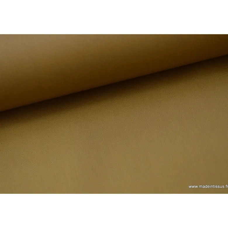 Tissu Gabardine enduite étanche camel.