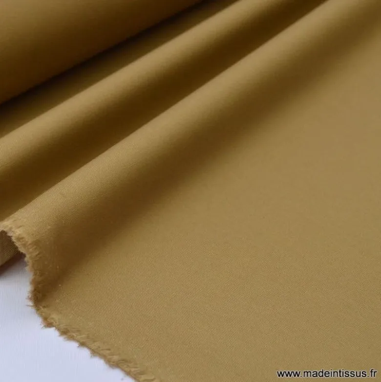 Tissu Gabardine enduite étanche camel.