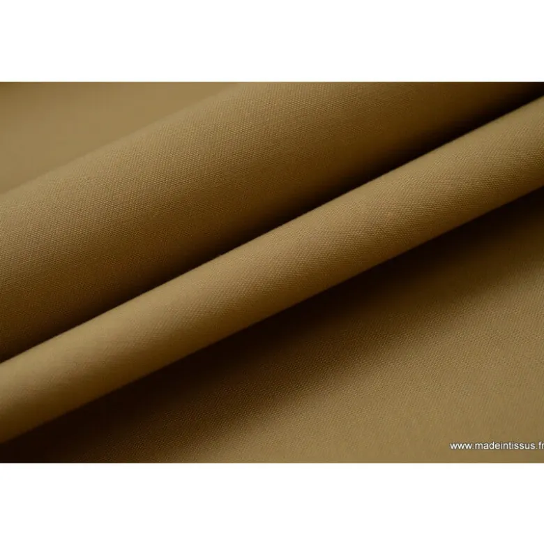 Tissu Gabardine enduite étanche camel.