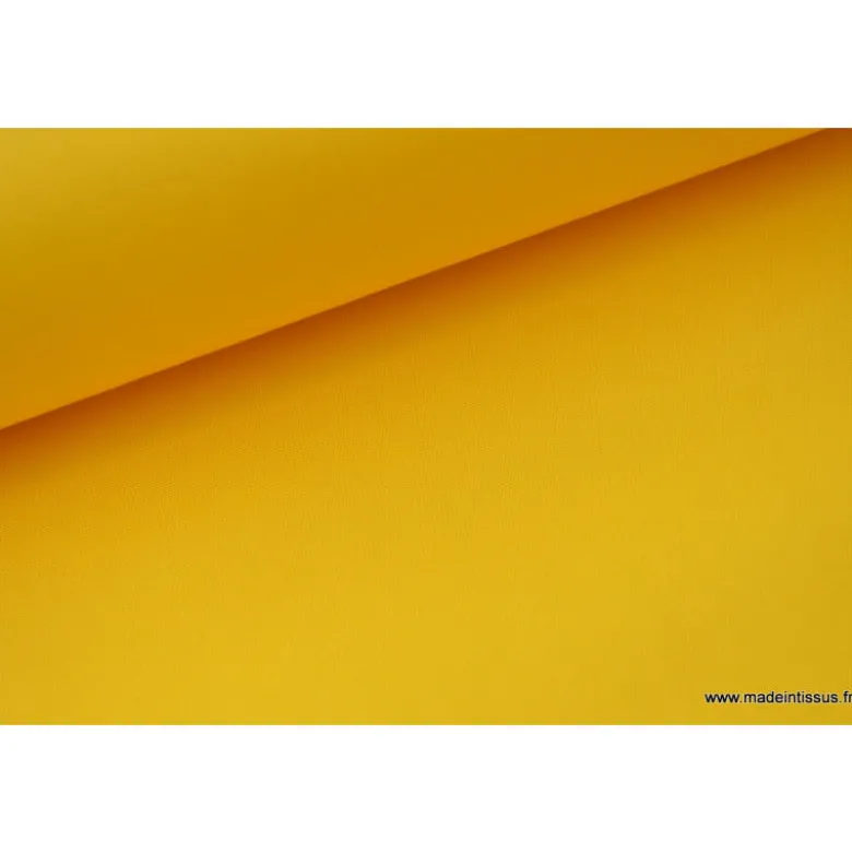 Tissu Gabardine enduite étanche jaune.