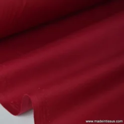 Tissu Gabardine enduite étanche rouge hermès.