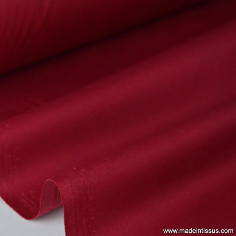 Tissu Gabardine enduite étanche rouge hermès.