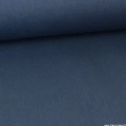 Tissu gabardine polyester viscose enduite étanche bleu denim.