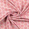 Tissu gaufré en coton motifs floraux graphique roses