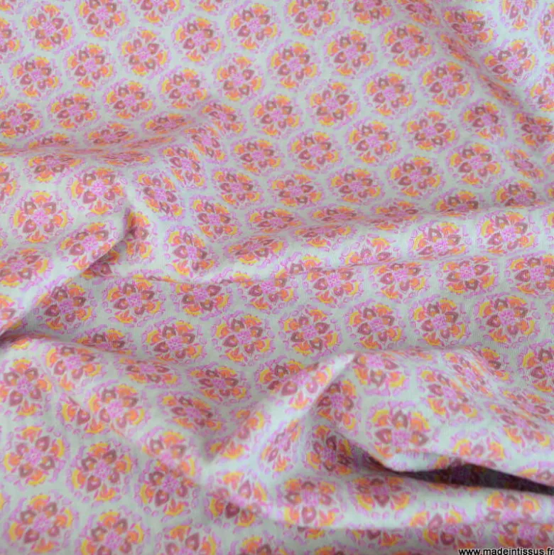 Tissu gaufré en coton motifs floraux graphique roses