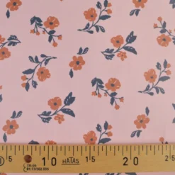 Tissu imperméable Alina type ciré de pluie motif fleurs fond Nude