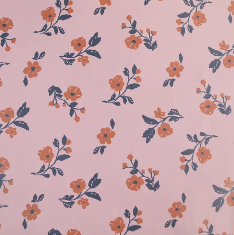 Tissu imperméable Alina type ciré de pluie motif fleurs fond Nude