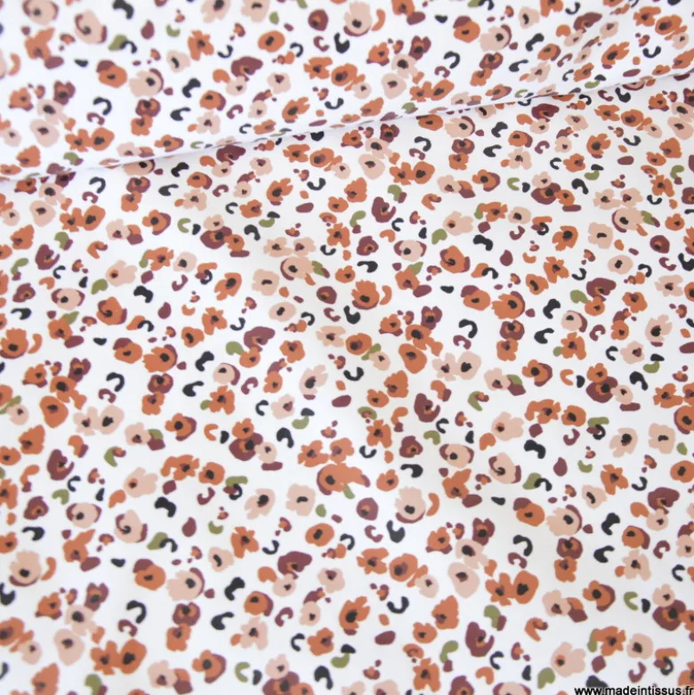 Tissu imperméable Ebbie type ciré motif léopard fond écru