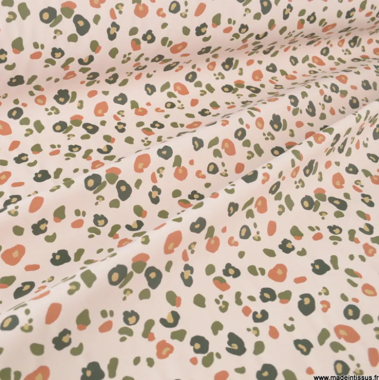Tissu imperméable Felyna type ciré motif léopard Graou fond écru