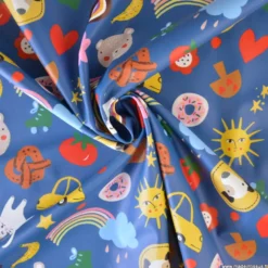 Tissu imperméable Funpets type ciré motif animaux fond bleu