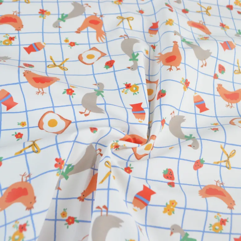 Tissu imperméable Kokott type ciré de pluie motif poules