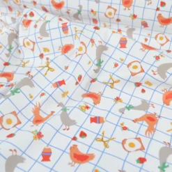 Tissu imperméable Kokott type ciré de pluie motif poules
