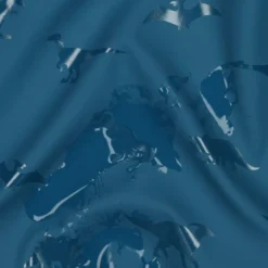 Tissu imperméable type ciré motif dinosaures fond bleu