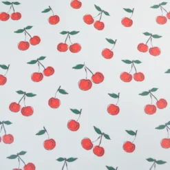 Tissu imperméable type ciré motif cerises fond blanc