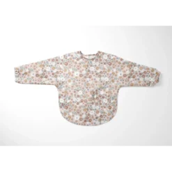 Tissu imperméable type ciré motif fleurs fond rose clair