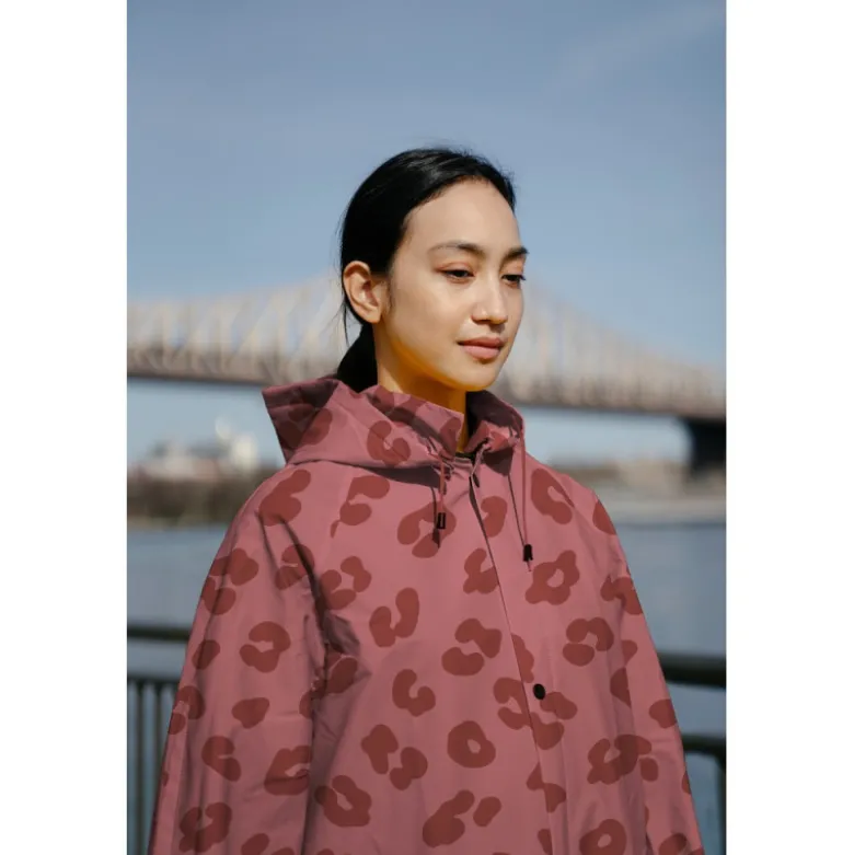 Tissu imperméable type ciré motif léopard fond Bordeaux