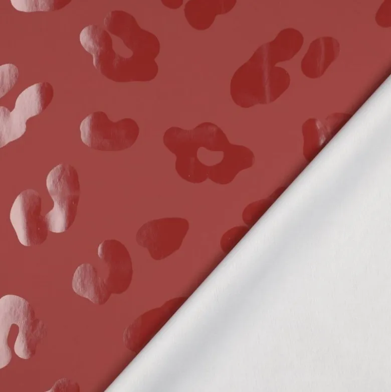 Tissu imperméable type ciré motif léopard fond Bordeaux