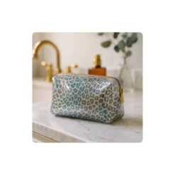 Tissu imperméable type ciré motif léopard à paillettes