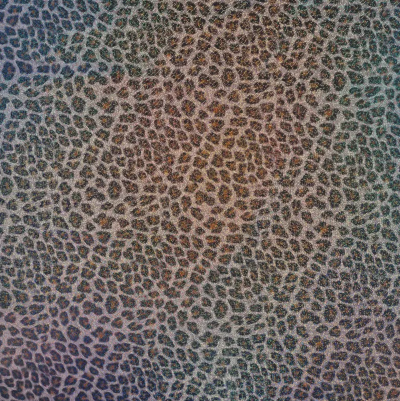 Tissu imperméable type ciré motif léopard à paillettes