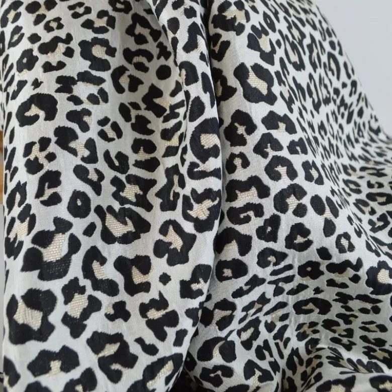 Tissu jacquard Habillement Leopard Lurex beige et Noir
