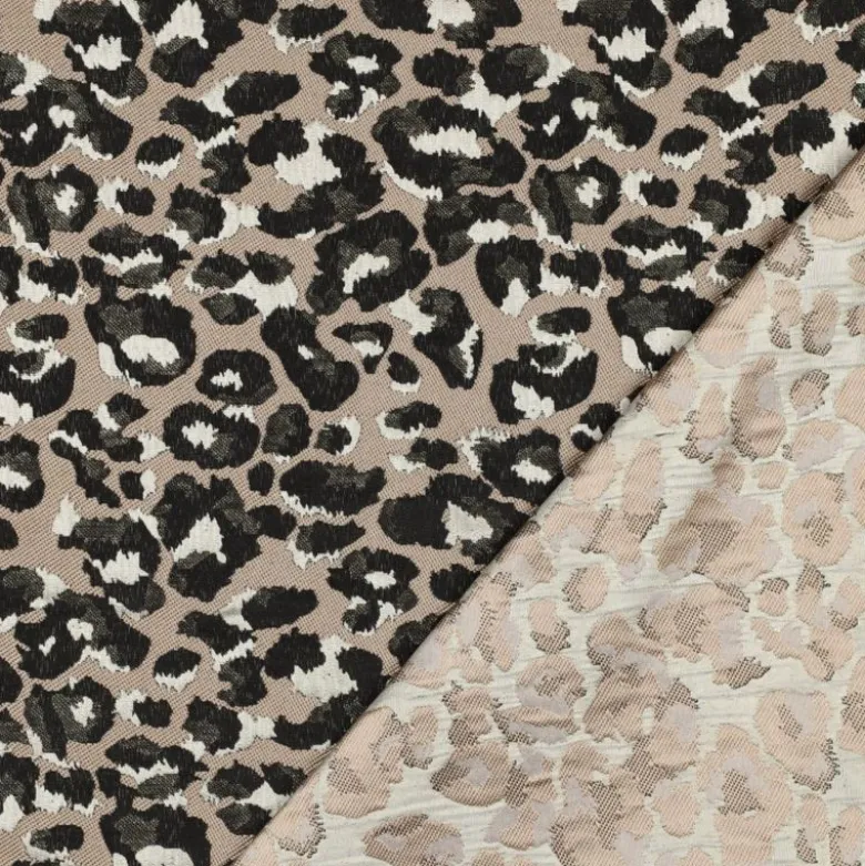 Tissu jacquard Habillement Leopard noir et doré fond beige