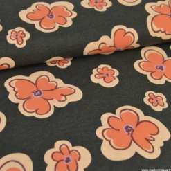 Tissu jersey coton Poppy motif fleurs orange sur fond noir