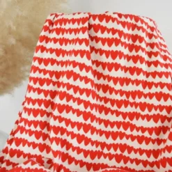 Tissu jersey côtelé bio motif coeurs rouges fond naturel - Poppy fabrics