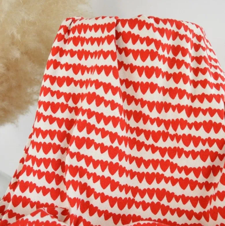 Tissu jersey côtelé bio motif coeurs rouges fond naturel - Poppy fabrics