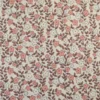 Tissu jersey côtelé bio motif fleurs roses et caramel fond naturel